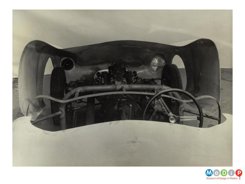 Scanned image showing a car body.