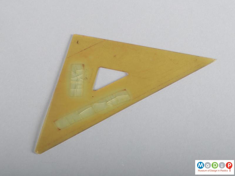 Side view of a set square showing the triangular shape.