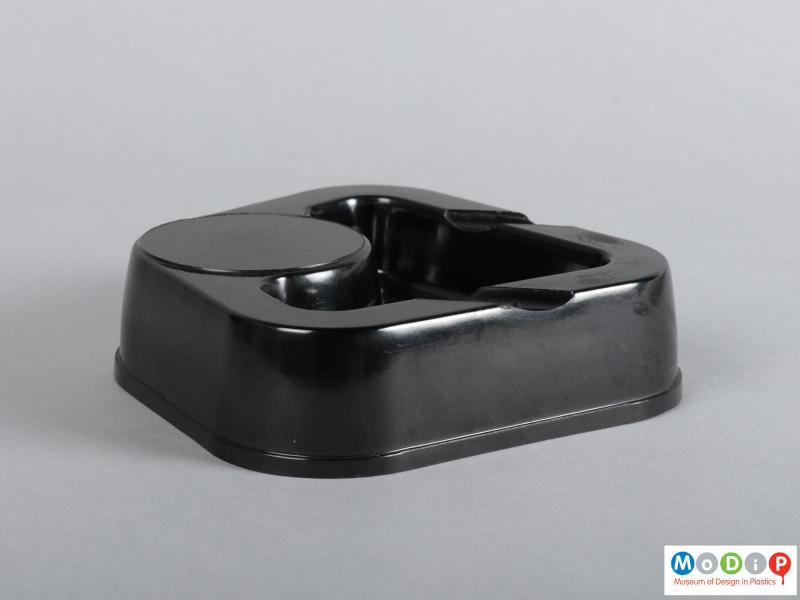 Side view of an ashtray showing the deep sides.