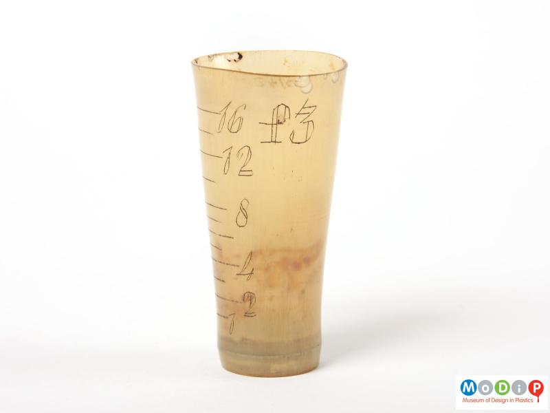 Side view of a beaker showing the measurement markings.