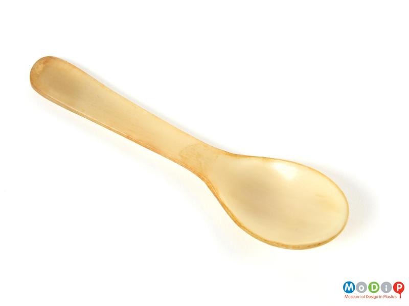 Top view of a spoon showing the bowl and handle.