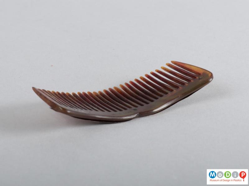 Side view of a comb showing the heading.