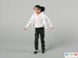 Front view of a Michael Jackson doll showing the white shirt, T-shirt and black trousers and shoes.