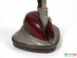 Close rear view of an Electrolux floor polisher showing the join between the handle and the base.