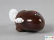 Top view of a brown M&M figure showing the depth of the dispenser.