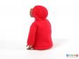 Rear view of a doll showing the red hooded jacket.