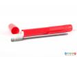 Side view of a Busy Brush showing the toothbrush removed from the holder.