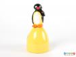 Front view of a Pingu sweet container showing the penguin standing on top of a yellow mound.