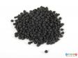 Top view of a pile of pellets showing the all black sample.