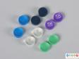 Top view of group of different contact lens buttons.