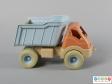 Side view of a toy truck showing the wheels.