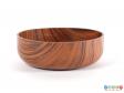 Side view of a bowl showing the wood grain effect.