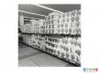 Scanned image showing packaged kitchen roll in a supermarket.