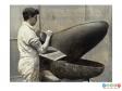 Scanned image showing a side car being removed from a mould.