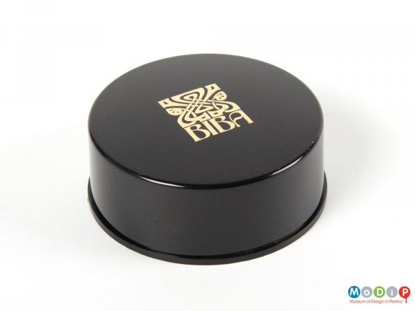 Top view of a Biba face powder box showing the smooth sides and the printed logo on the lid.