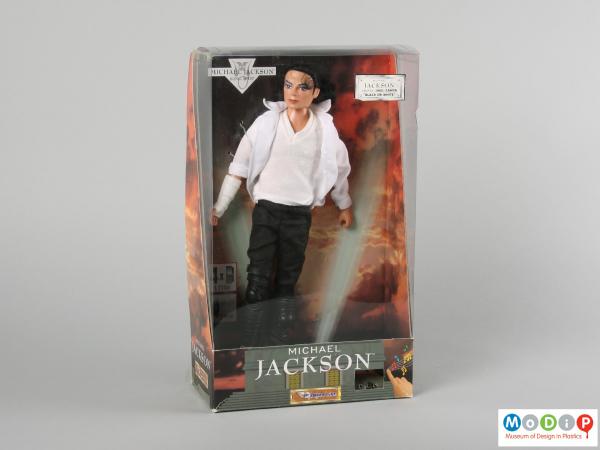 Front view of a Michael Jackson doll showing the doll in its original packaging.