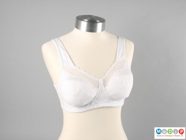 Front view of a bra showing the wide shoulder straps.