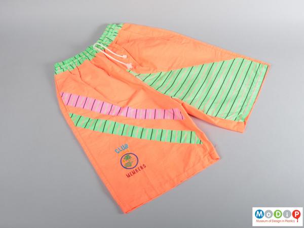 Front view of a pair of swimming shorts showing the striped pattern.