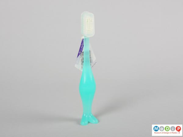 Front view of a toothbrush showing the body shape.