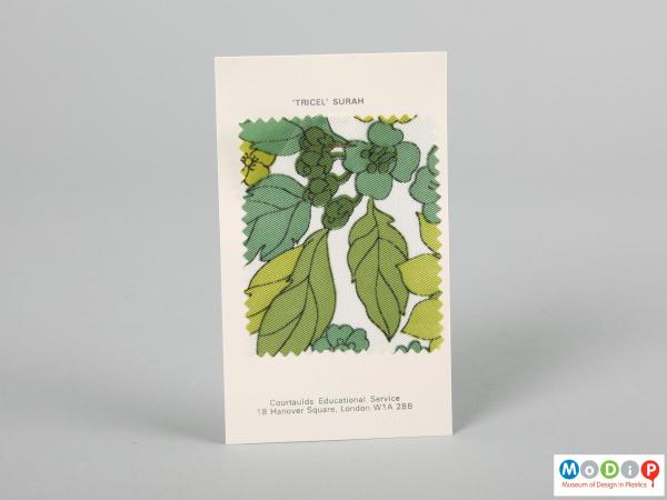 Front view of a fabric sample card showing the plain back.