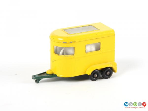 Side view of a toy vehicle showing the side and roof windows.