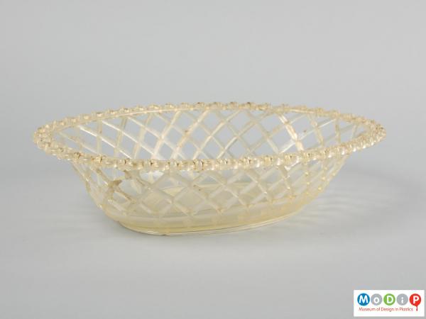 Side view of a fruit bowl showing the open design.