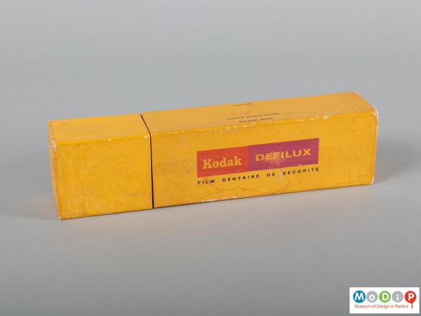 Side view of a dental film showing the packaging.