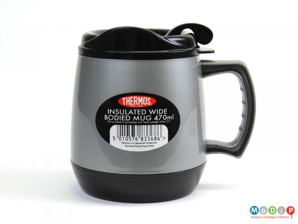 Side view of an insulated mug showing the ergonomic grip on the handle.
