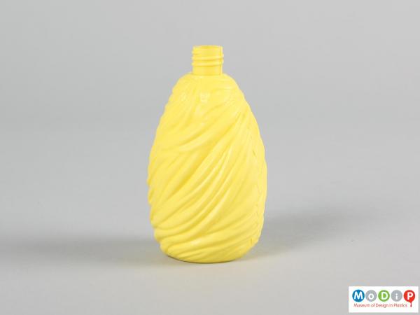 Side view of a syrup bottle showing the moulded 'whipped' texture.