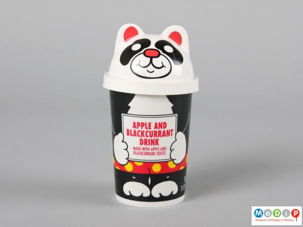 Side view of a Panda cup showing the printed feet and shorts.