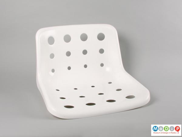 Front view of a seat showing the pattern of holes.