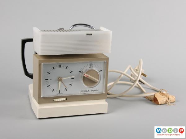 Front view of a Teasmade showing the clock face.