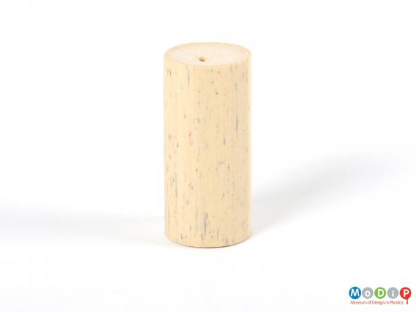 Side view of a cork showing the straight edges and nature-effect colouring.