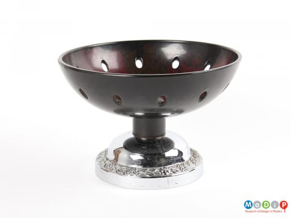 Side view of a bowl showing the dish and stand.