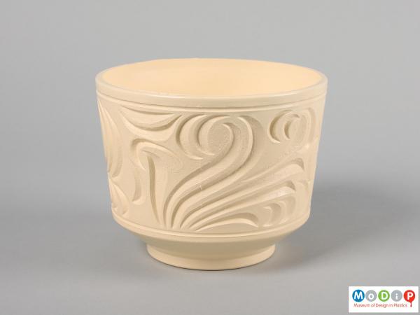 Side view of a plant pot showing the moulded pattern.