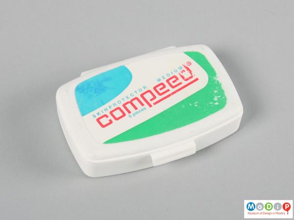 Top view of a Compeed box showing the adhesive label.