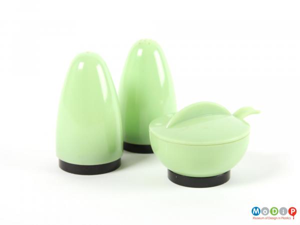 Side view of a cruet set showing the conical shape.