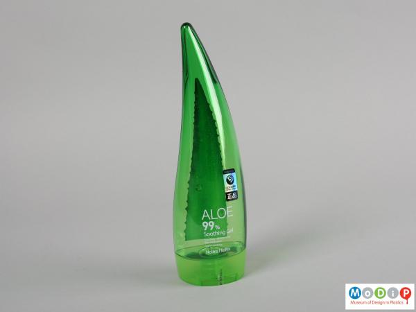 Front view of a bottle showing the curved leaf-like shape.