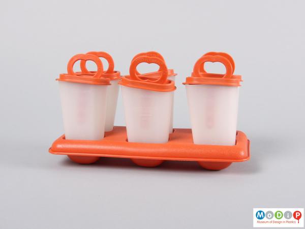 Side view of an ice lolly set showing the moulds in the base.