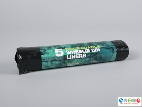 Front view of a roll of bin bags showing the printed label.