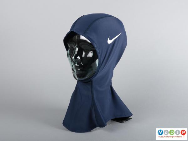 Front view of a swim hijab showing the Nike logo.