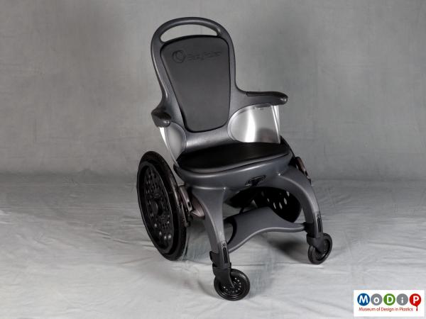 Front view of a wheelchair showing the small front wheels.