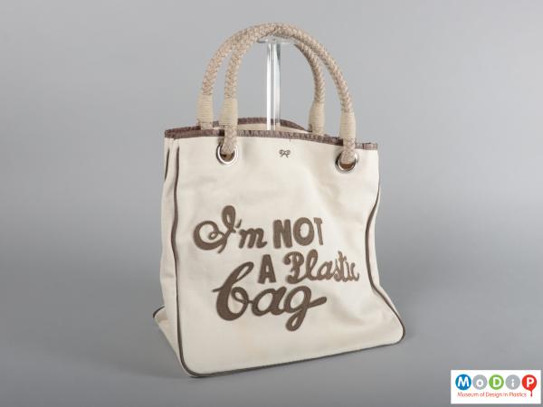 Front view of a bag showing the appliqued lettering.