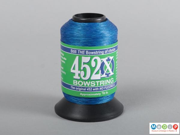 Side view of a bowstring showing the sales label.