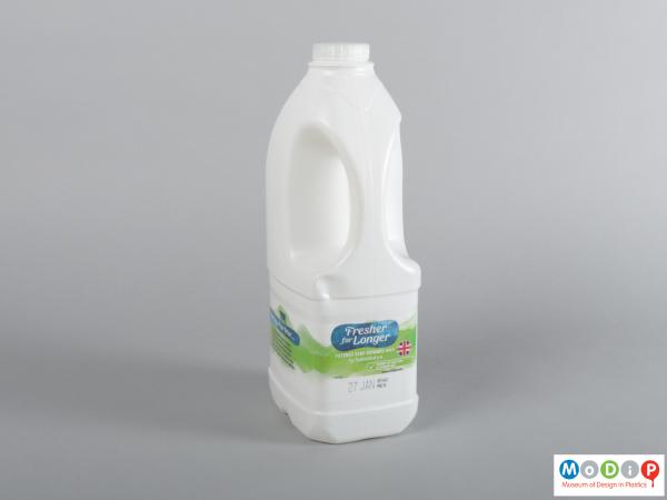 Front view of a milk bottle showing the handle.
