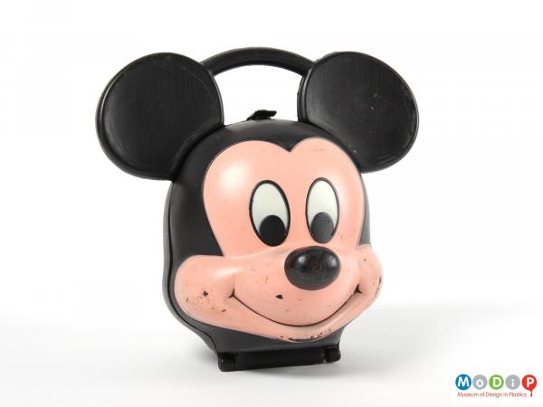 Front view of a Mickey Mouse lunch box showing the face and ears.