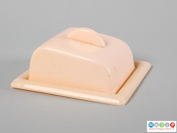 Side view of a butter dish showing the wedge shape.