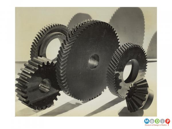 Scanned image showing gear wheels.
