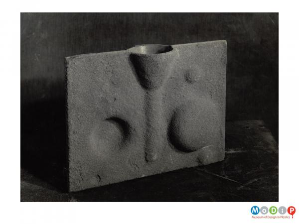 Scanned image showing a pair of half moulds.