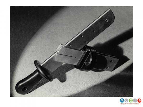 Scanned image showing a lever switch.